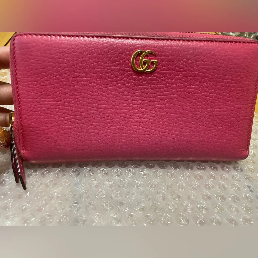 Gucci GG Marmont zip-around wallet in shocking pink